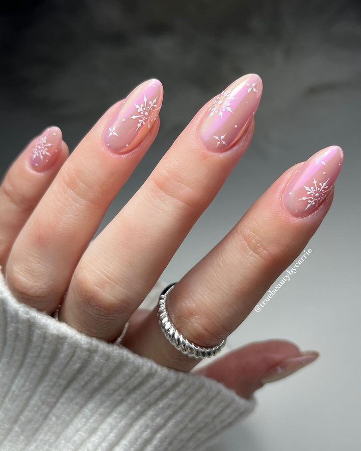 snowflake nails in pastel pink base