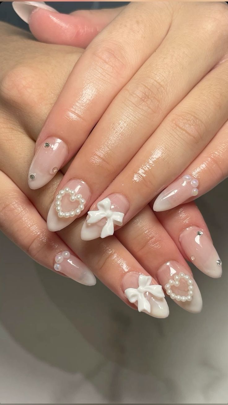 Elegant Pearl and Bow Valentine’s Nails for a Touch of Romance